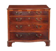 A George III mahogany serpentine fronted chest of drawers, circa 1770, the shaped top with moulded