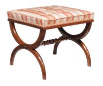 ϒ A Regency rosewood and buttoned silk upholstered x-framed stool, circa 1815