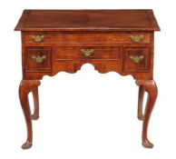 A cherry side table, mid-18th century, with fruitwood banding throughout, the quarter veneered and