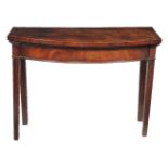 A George III mahogany side or serving table, circa 1780, of bow front outline, with a moulded