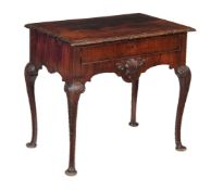 A George II Irish mahogany side table, circa 1740, the rectangular top with leaf moulded edge