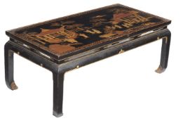 A Chinese black lacquer and gilt decorated coffee table, late 19th/20th century, the top decorated