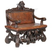 A Continental carved walnut hall bench, in Renaissance revival taste, 19th century, the tooled