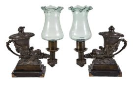 A pair of George IV patinated bronze colza oil table lamps in the form of antique rhytons, circa