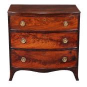 A George III mahogany bowfront chest of drawers, circa 1790, the shaped top above three long