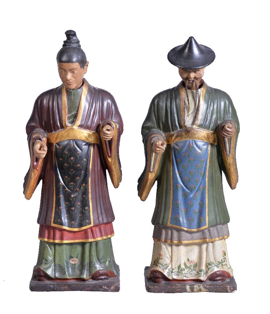 A pair of Continental painted and parcel gilt plaster models of Chinamen, second half 19th