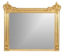 A William IV carved giltwood wall mirror, circa 1835, the rectangular plate within a mottled frame