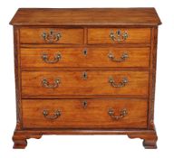 A George III padouk chest of drawers, circa 1770, the rectangular top with moulded edge, above two