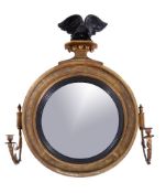 A late George III giltwood and composition convex wall mirror, circa 1805, by R. Cribb & Son,