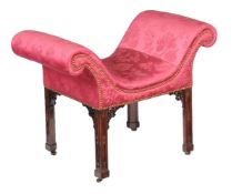 A George III mahogany and upholstered window seat, circa 1770, the dished seat incorporating a