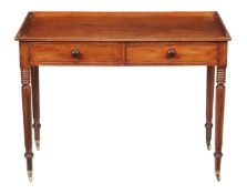 A Regency mahogany dressing table, circa 1825, the rectangular top with three quarter gallery, above
