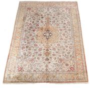 A Ghom Erami silk carpet, approximately 298 x 198cm