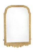 A carved giltwood and gesso wall mirror, in George I style, second half 19th century, the shaped and