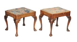 A companion pair of George II mahogany and tapestry upholstered stools, circa 1740, each tapestry