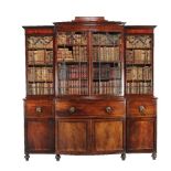 ϒ A Regency mahogany and ebony inlaid library bookcase, circa 1815