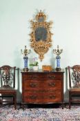 A George III mahogany serpentine fronted dressing chest, circa 1780, with chevron stringing