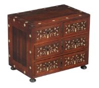 ϒ An Indo-Portuguese rosewood table top cabinet, early 18th century, inlaid with bone throughout,