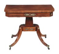 A Regency mahogany card table, circa 1815, the canted top opening to baize playing surface and