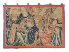 A Flemish tapestry depicting a reclining youth and noblewomen, late 16th century, the opulently