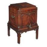 A George III mahogany wine cooler, circa 1760, in the manner of Thomas Chippendale, the hinged lid