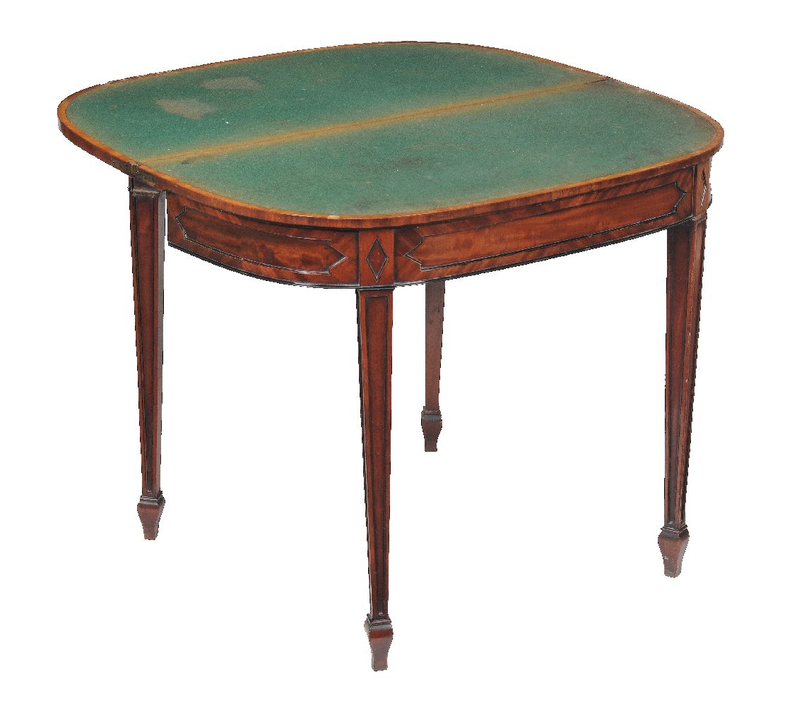 A pair of George III mahogany card tables, circa 1780, each D shaped hinged top opening to a baize - Image 7 of 7