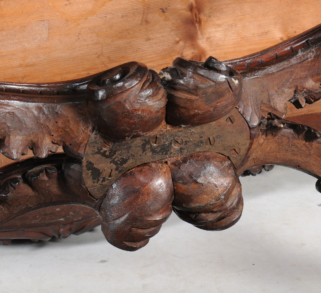 An Italian carved walnut library or centre table, circa 1870, the cartouche shaped top with - Image 9 of 9