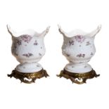 A pair of Meissen gilt-metal mounted two-handled bottle coolers, the porcelain mid 18th century,