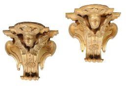 A pair of carved giltwood wall brackets, in 18th century style, 19th century, of breakfront form,