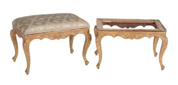 A pair of Italian giltwood stools, circa 1770, each carved throughout with foliate and scroll