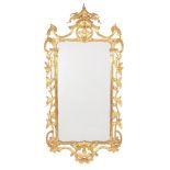 A pair of carved giltwood wall mirrors, in George III style, 20th century, each rectangular plate