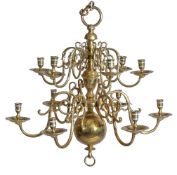 An English or Dutch brass twelve light chandelier, first quarter 18th century, the sockets and