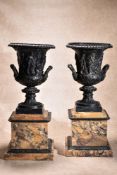 A pair of impressive bronze and marble mounted models of the Medici vase, circa 1875, with egg-and-