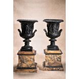 A pair of impressive bronze and marble mounted models of the Medici vase, circa 1875, with egg-and-