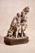 ϒ A fine Continental, probably German sculpted ivory Bacchic group, circa 1800