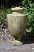 A white marble garden urn in Grecian style, almost certainly early 19th century, the shallow domed