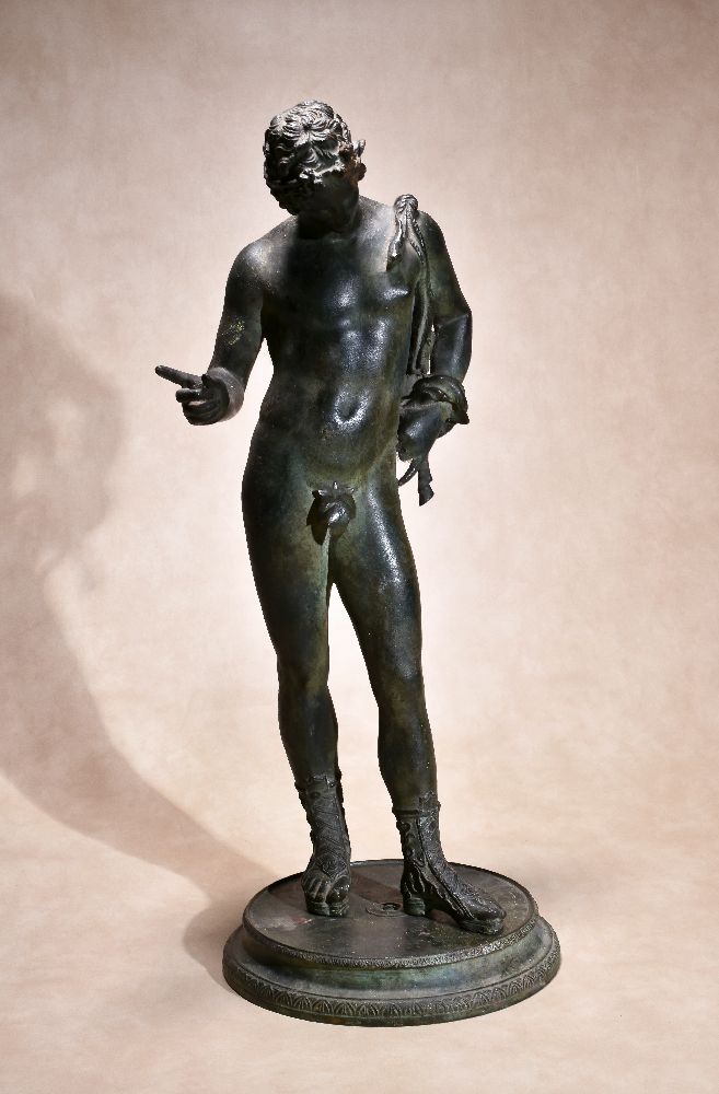 A Neapolitan patinated bronze model of Narcissus, cast after the Antique, late 19th century,