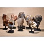 Eight various polished freeform mineral specimens, with bespoke wrought iron stands, including