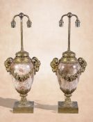 A pair of Continental striated marble and gilt bronze mounted urn table lamps in Louis XVI style,