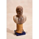 An Italian cameo carved sardonyx bust of a Blackamoor, in 16th century style, 19th century,