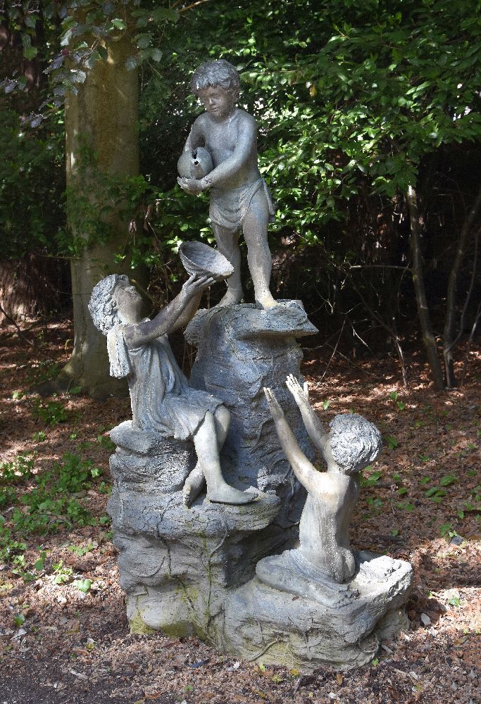A bronze alloy figural garden fountain, last quarter 20th century, modelled with three children on