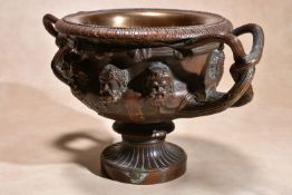 A near pair of patinated bronze models of the Albani Vase, circa 1875, cast after the Antique,