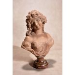 Circle of Augustin Pajou, (French 1730 ~ 1809), a sculpted terracotta bust of a maiden, possibly a