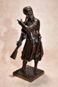 Armand-Jules Le Véel, (French 1821 ~ 1905), a patinated bronze model of a Berber guard, portrayed