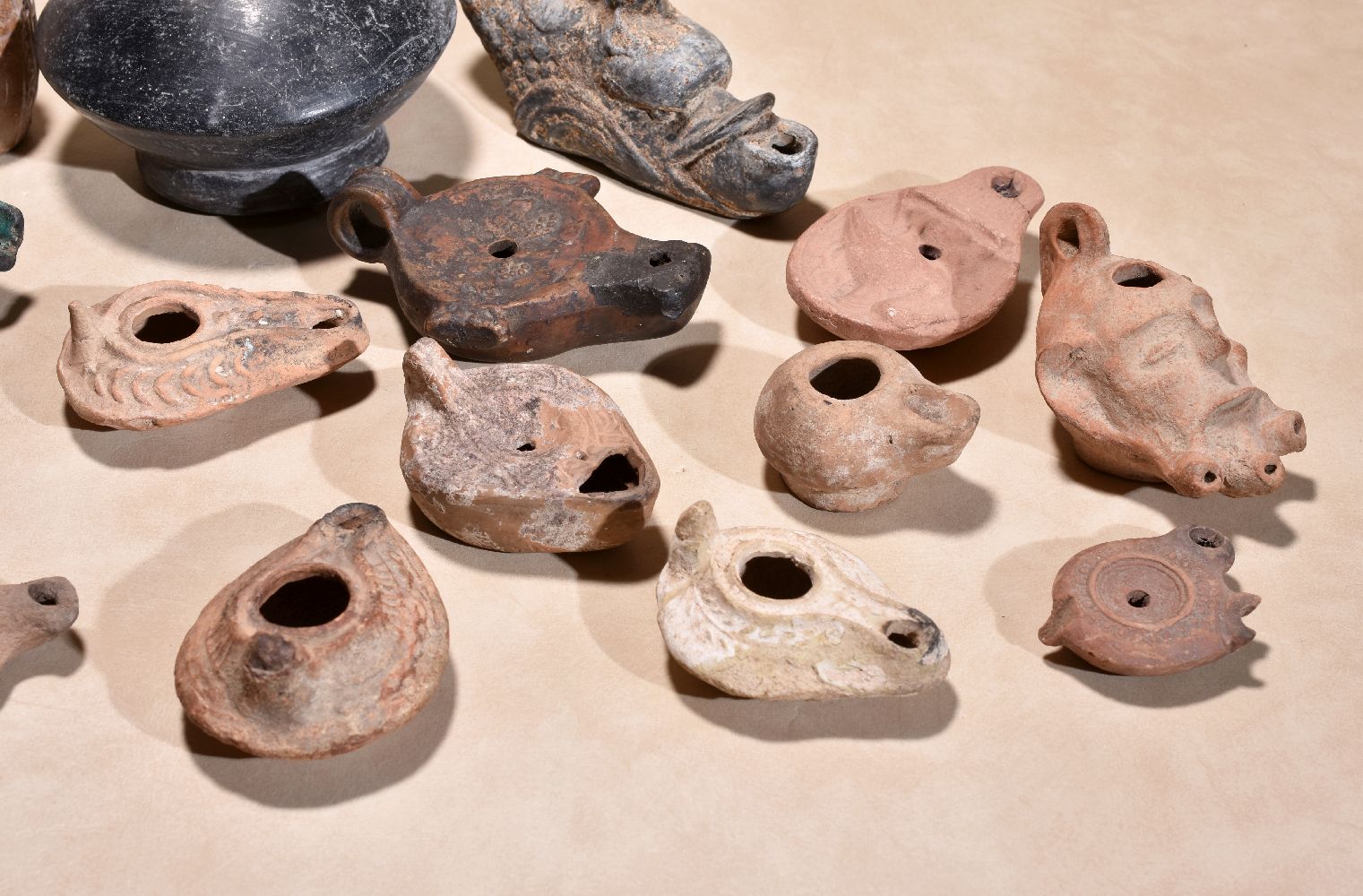 A collection of Roman pottery oil lamps, circa 3rd ~ 5th century A.D., the largest 12cm long; an - Image 3 of 4