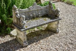 A stone composition garden seat in Renaissance style, second half 20th century, the backrest cast