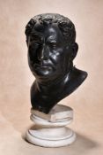 A patinated bronze bust of the Emperor Vitellius, probably 17th century and later mounted, cast