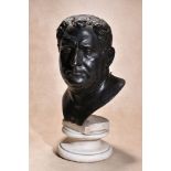 A patinated bronze bust of the Emperor Vitellius, probably 17th century and later mounted, cast