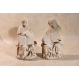 Two German sculpted limestone models of Evangelists, Middle Rhine, circa 1400, both portrayed as