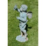 A verdigris patinated bronze alloy garden fountain modelled as Cupid, 20th century, portrayed