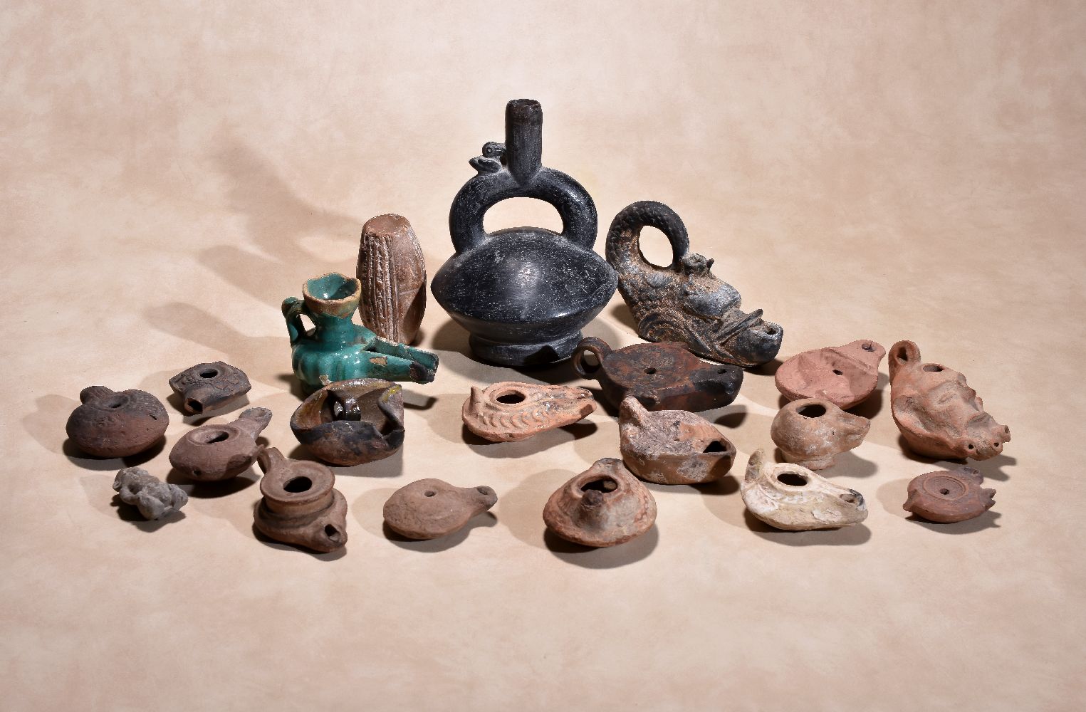 A collection of Roman pottery oil lamps, circa 3rd ~ 5th century A.D., the largest 12cm long; an